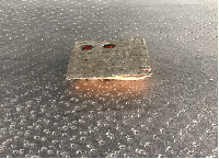 Dominique De Beir stuurde deze foto toe - voor gebruik voor de pers of een uitnodigingskaart - op een zilvergeschilderde, geperforeerde ondergrond van karton, ligt een polystireen object in oranje, eveneens in zilverkleur geschilderd en geperforeerd.
PHŒBUS•Rotterdam