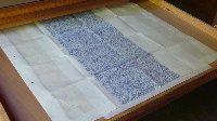 Toon Van Borm, vier carbontekeningen 'Little Flag', japans papier, de randen omvouwen en met rijstzetmeel verlijmd, daarin roestvrijstalen ogen.
PHŒBUS•Rotterdam