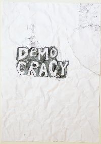 Gilbert van Drunen, ''Democracy'', 2009, potlood op papier, A4; het verfrummelde papier 'democracy' is weer ontvouwd, ingelijst. 1/10 UNICUM
PHŒBUS•Rotterdam