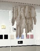 Célio Braga, expositie in Kunstmuseum Den Haag 10 juni - 10 september 2023: SKIN WOUND QUEER; twee groepen werk gaan over ''SHIRTS'': de “23 White Shirts”, 2000-2001, formaat variabel afhankelijk van plaatsing; met overhemden, vaak gekregen van aidsvrienden, die in elkaar gevouwen en opgeborduurd zijn. En, “14 Portraits: of Myself, of Friends, Friends of Friends, Acquaintances”, 2023; deconstructed men’s shirts hand stiched over a wooden stretcher, each 35 x 30 cm.
PHŒBUS•Rotterdam