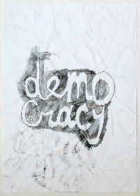 Gilbert van Drunen, ''Democracy'', 2009, potlood op papier, A4; het verfrummelde papier 'democracy' is weer ontvouwd, ingelijst. 8/10 UNICUM
PHŒBUS•Rotterdam