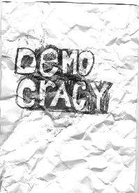 Gilbert van Drunen, ''Democacy II'', 2009, potlood op papier, A4;

het verfrummelde papier 'democracy' is weer ontvouwd, ingelijst
PHŒBUS•Rotterdam