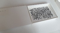 Rabin Huissen, detail installatie met museumkartonnen dozen, waarin tekeningen, collages, werken in foto-emulsie/papier - expositie Amsterdam Drawing 2016, met Toine Horvers, Joachim Bandau, Michael Toenges.
PHŒBUS•Rotterdam